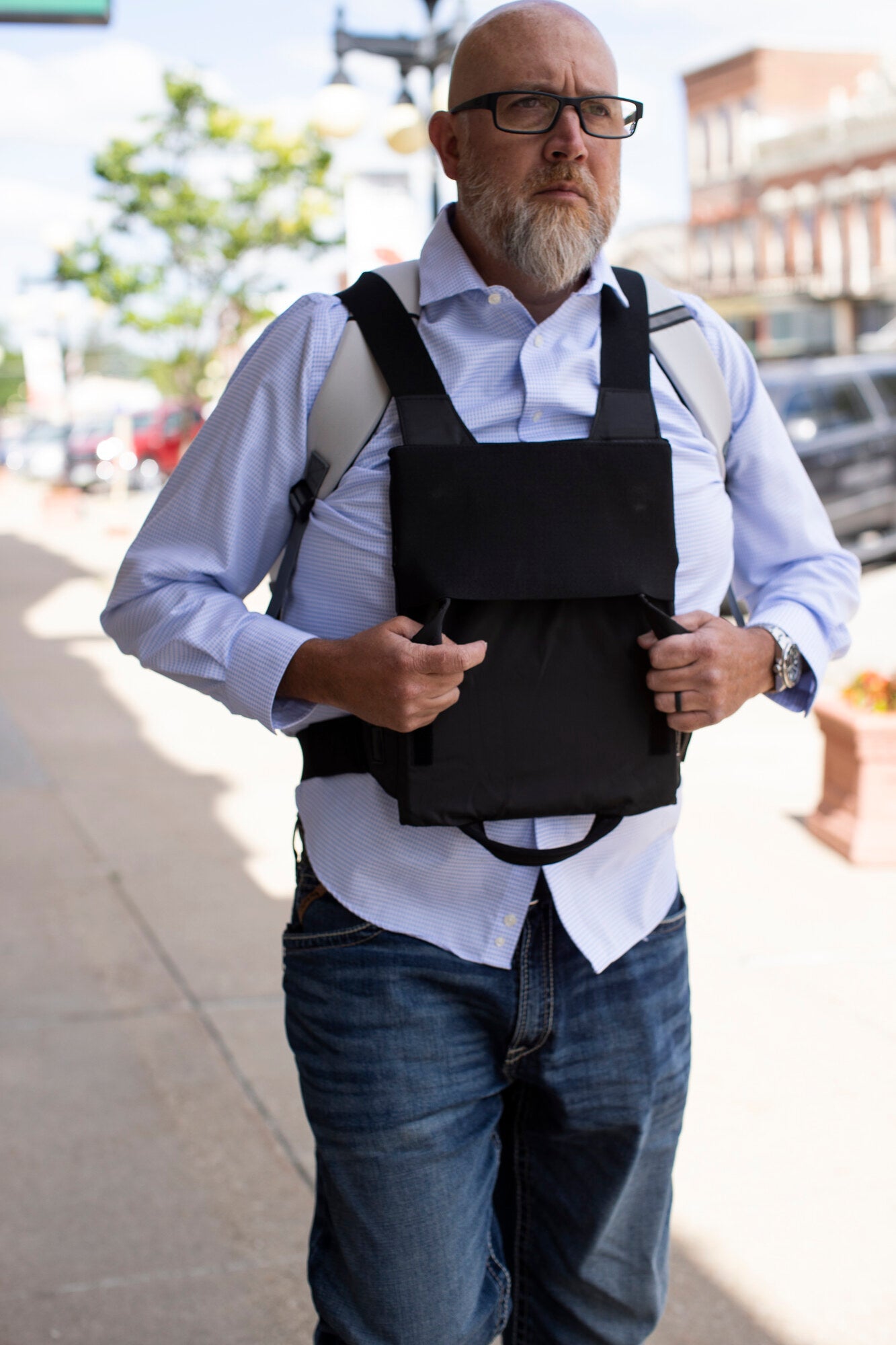 Adult with a BP Defence bullet-resistant backpack