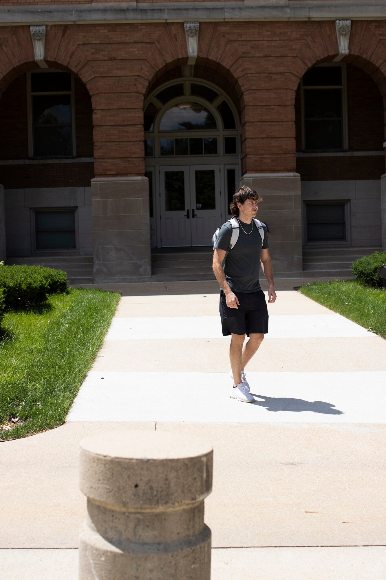 Adult wearing a BP Defence bullet-resistant backpack