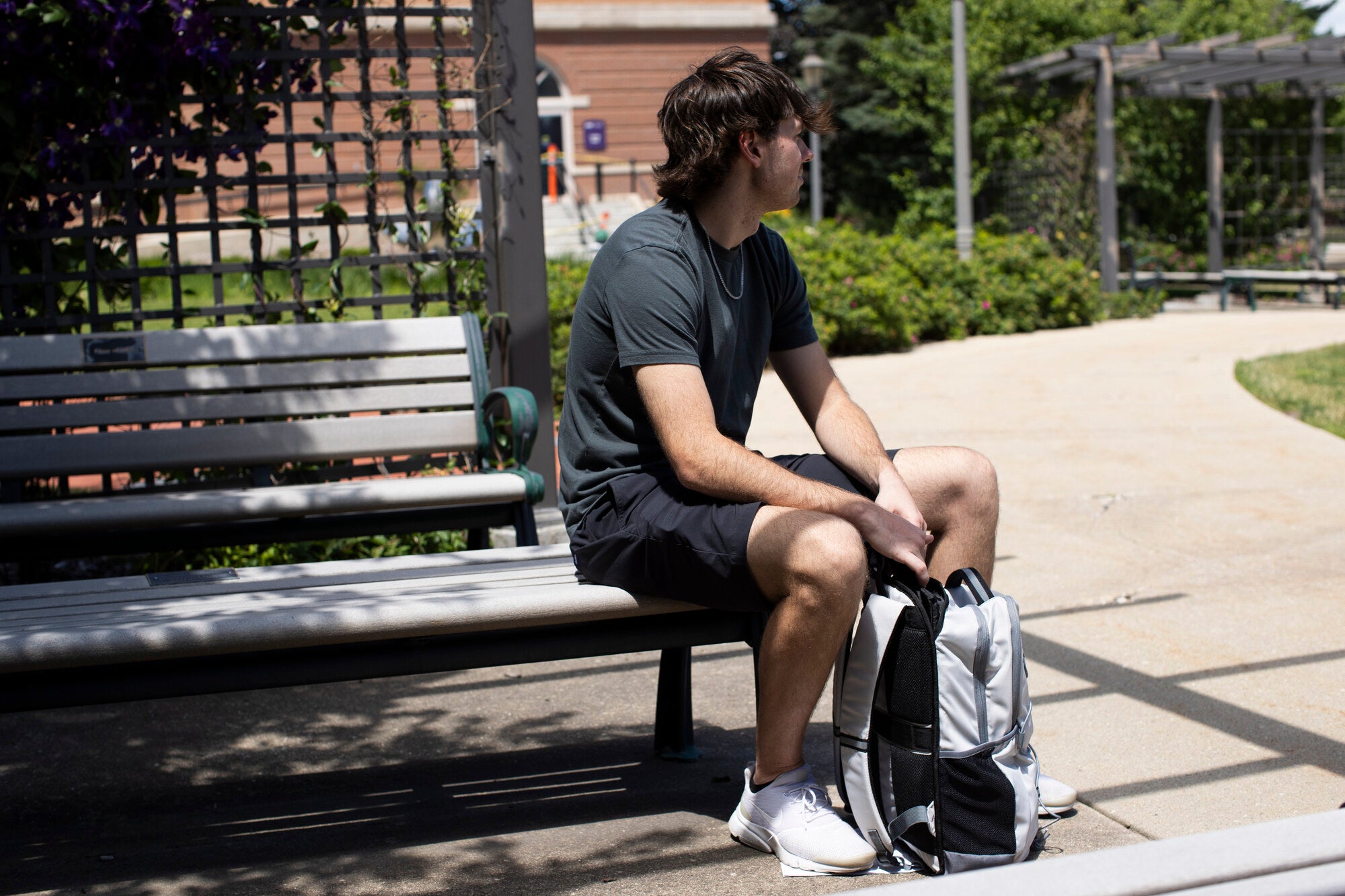 Adult wearing a BP Defence bullet-resistant backpack