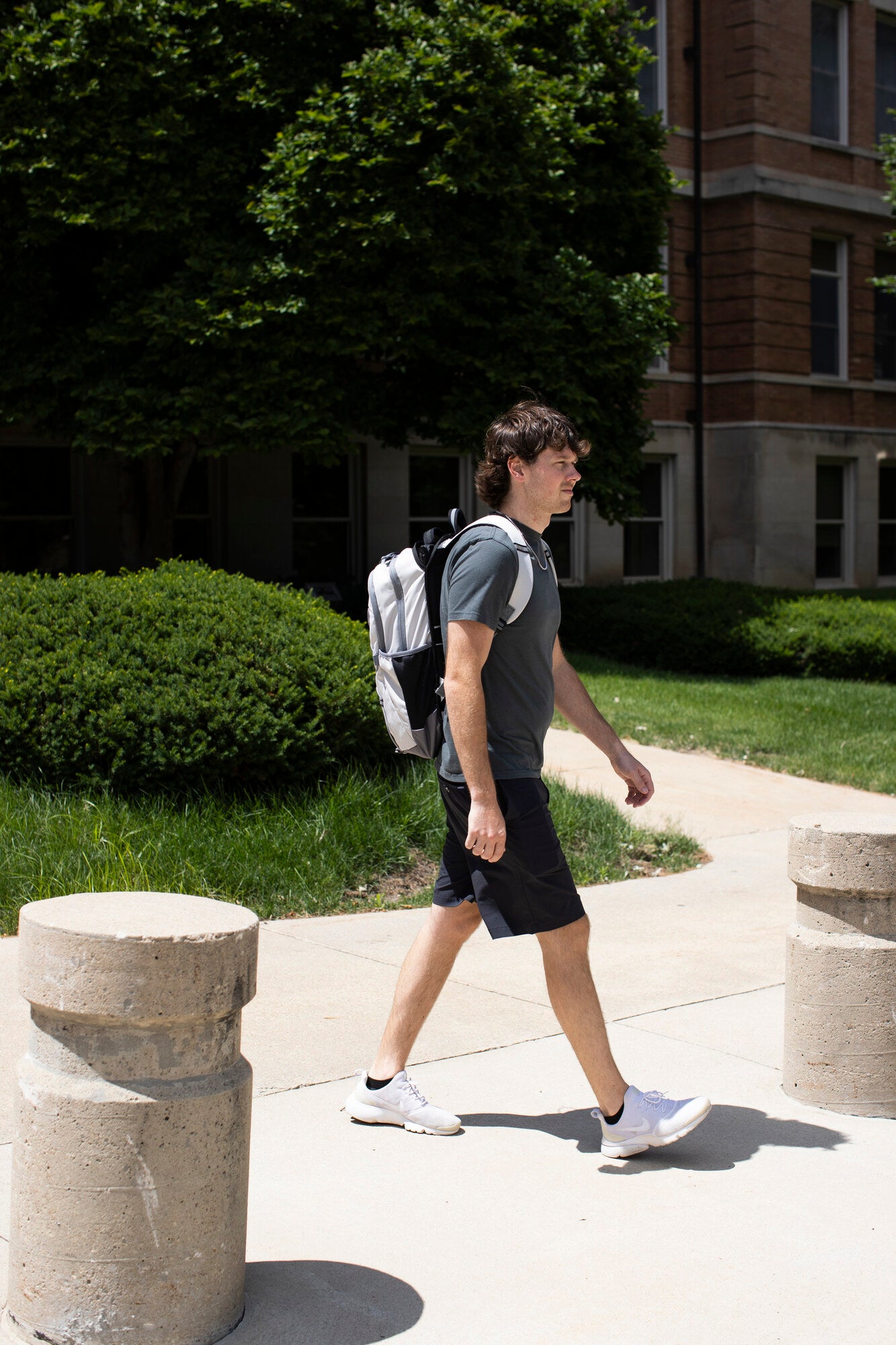 Adult wearing a BP Defence bullet-resistant backpack